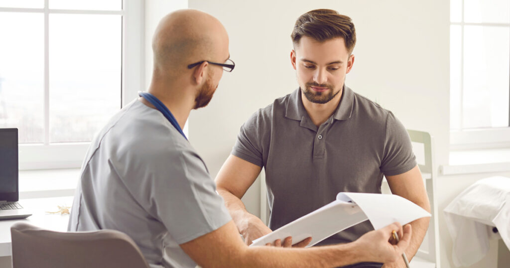 TRT treatment for men consultation explaining testosterone therapy process and hormone testing
