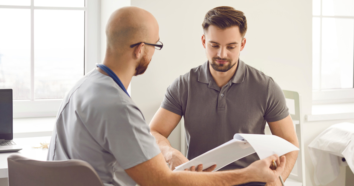 TRT treatment for men consultation explaining testosterone therapy process and hormone testing